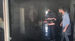Yangında mahsur kalan çocuğu vatandaşlar kurtardı