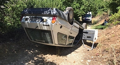 Ters dönen otomobilin sürücüsü yaralandı