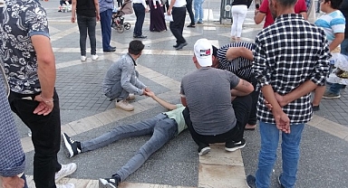 Fenalaşarak yere yığılan genç ekipleri harekete geçirdi