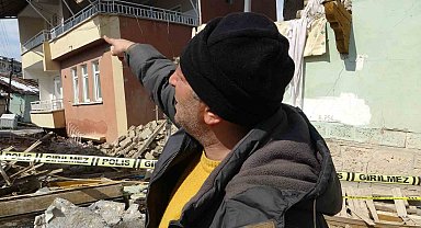 Depremde ağır hasan alan binanın birinci katı yere gömüldü