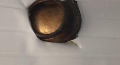 Evde patlayan tüpün parçası, konteyneri deldi geçti