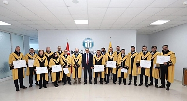 Rektör Akpolat unvanda yükselen akademisyenlere cübbelerini giydirdi